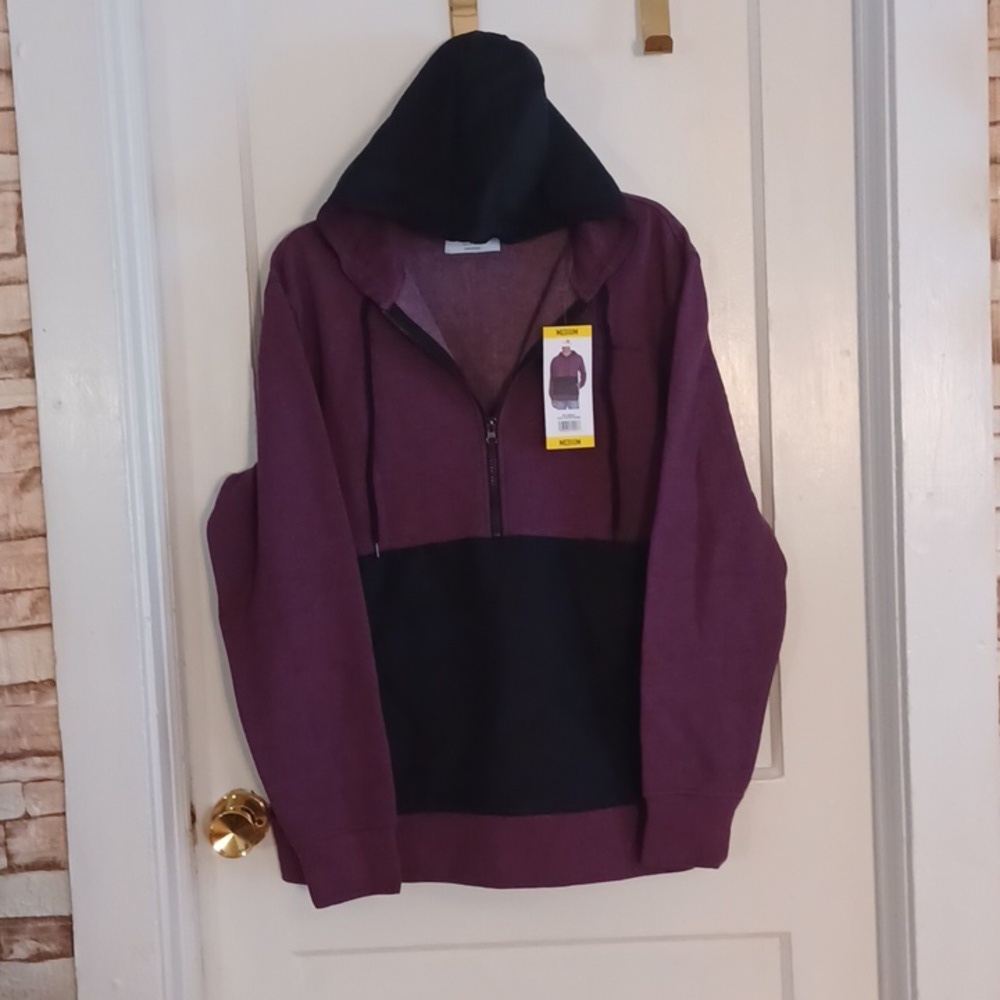 Champion hooded sweatshirt  Athletes wear men's size medium